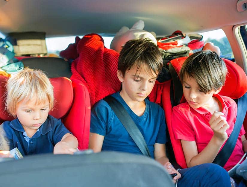 Kids In Car Playing Game